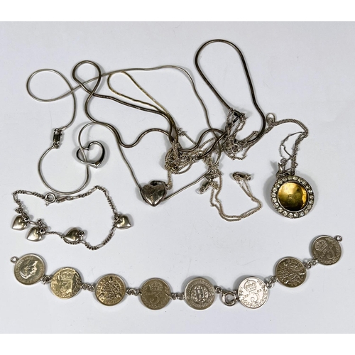 745B - A bracelet formed from 8 x 3d coins, dates 1920's & 1930's (one chain link missing); a chain bra... 