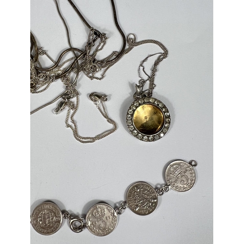 745B - A bracelet formed from 8 x 3d coins, dates 1920's & 1930's (one chain link missing); a chain bra... 