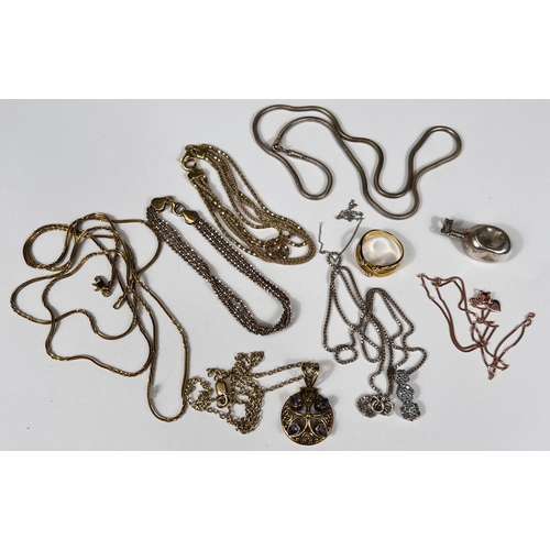 745D - A selection of gold plated silver and other chains, ring etc.