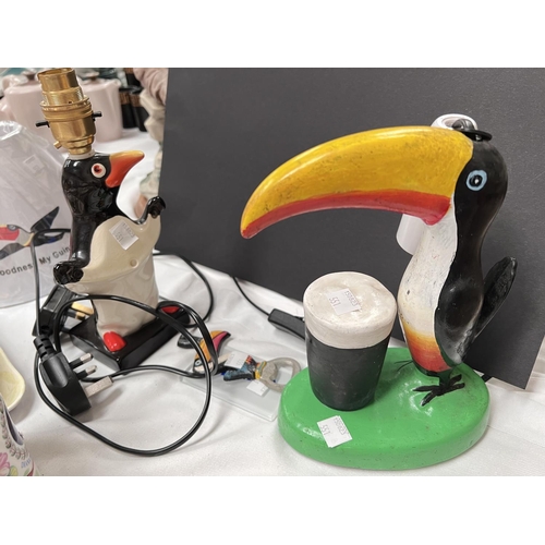 551 - A Carlton ware Guinness penguin lamp, another similar Toucan Carlton ware style lamp, etc