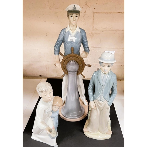 593 - A Lladro figure:  young sailor at the wheel, height 35cm; 2 children with candle; a Lladro styl... 