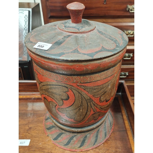 800 - A Scandinavian carved wooden lidded pot with gilt and red painted decoration, height 43cm