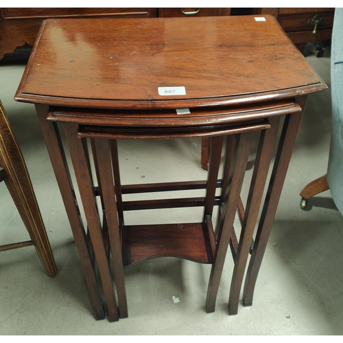 807 - A nest of 3 mahogany occasional tables