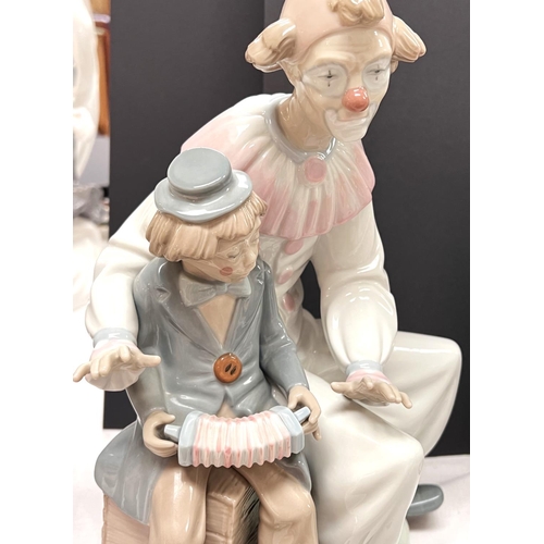 501 - Lladro 'Circus Magic' -  Clown figure with a top hat and kittens, height 26cm (base cracked); a larg... 