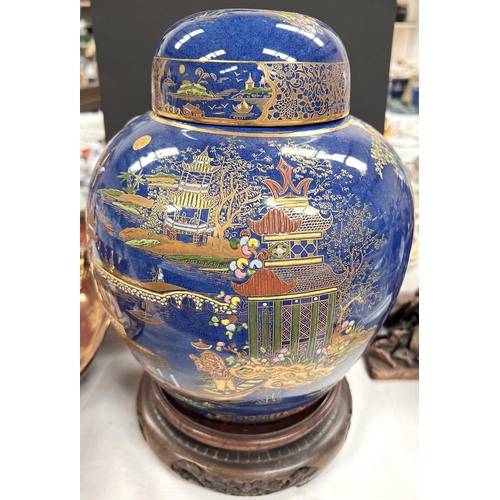 525 - A Carltonware large ginger jar decorated with a chinoiserie river scene on blue ground, height 26cm,... 