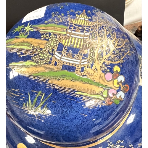 525 - A Carltonware large ginger jar decorated with a chinoiserie river scene on blue ground, height 26cm,... 