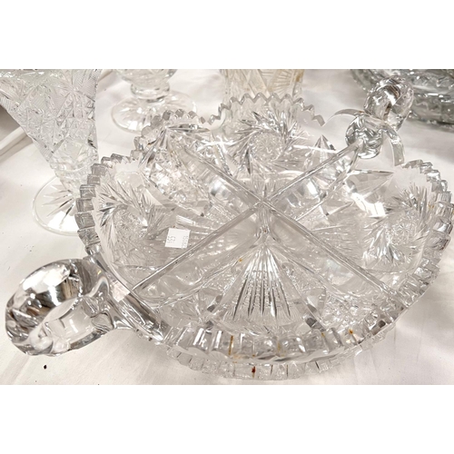 534 - A cut crystal heavy boat shaped fruit bowl; similar dishes; plates; etc.