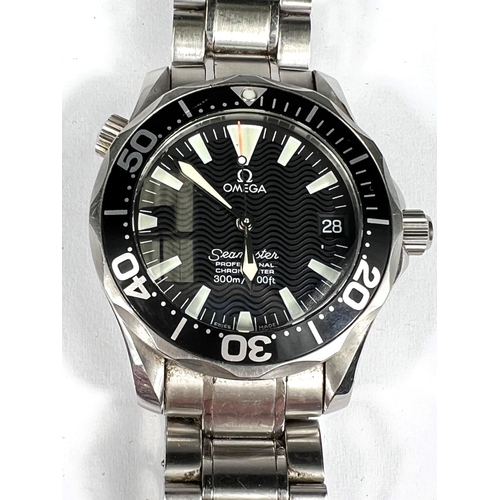 741 - OMEGA: a circa 2000's Omega Seamaster professional chronometer with black wave dial and black bezel ... 