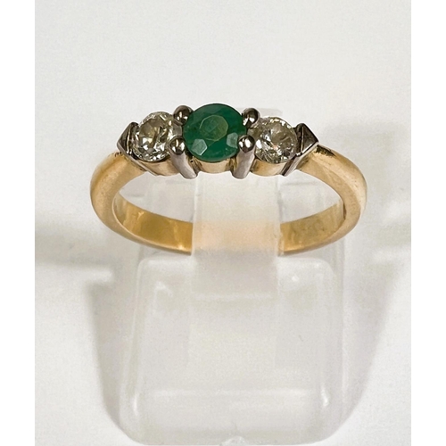 746D - A yellow metal 3 stone emerald and diamond ring, unmarkd (tests as 9ct+) 3.7gm