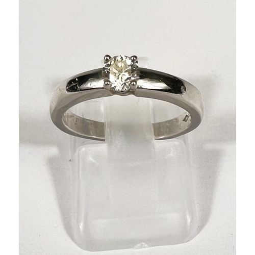 747D - A hallmarked platinum solitare ring set with a diamond approximately .3 carat, diameter approximatel... 