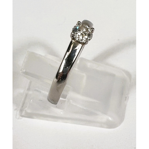 747D - A hallmarked platinum solitare ring set with a diamond approximately .3 carat, diameter approximatel... 