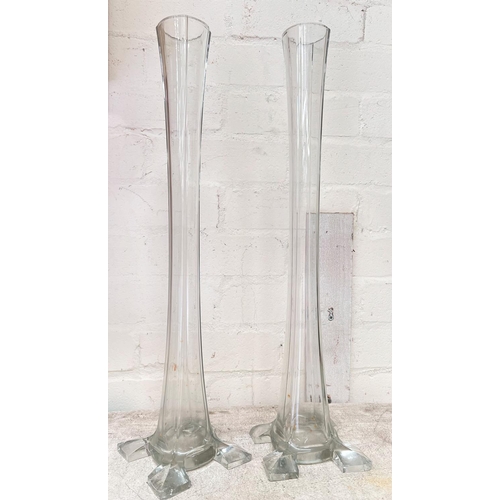 507A - A pair of tall slender ribbed vases, height 50cm.