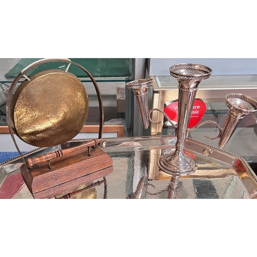 685A - A silver plated epergne and a dinner gong.