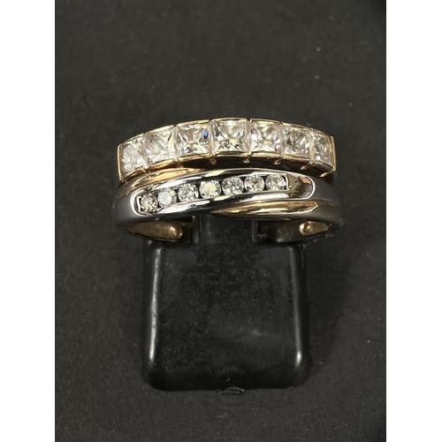 746B - A seven stoe diamond half ternity ring stamped '375'; a 9 carat hallmarked gold ring set with7 clear... 