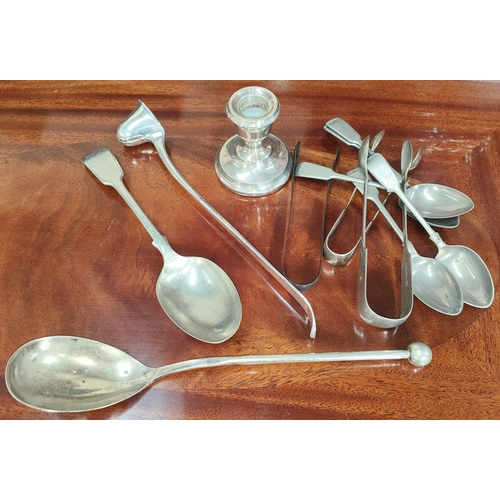 738B - A possibly Scandinavian white metal candle snuffer, a hall marked silver dwarf candlestick and a col... 