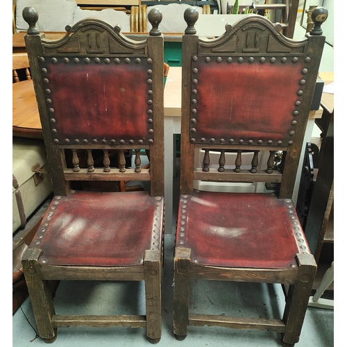 789 - A pair of large gothic style high back stained wood chairs with leather effect studded back and seat