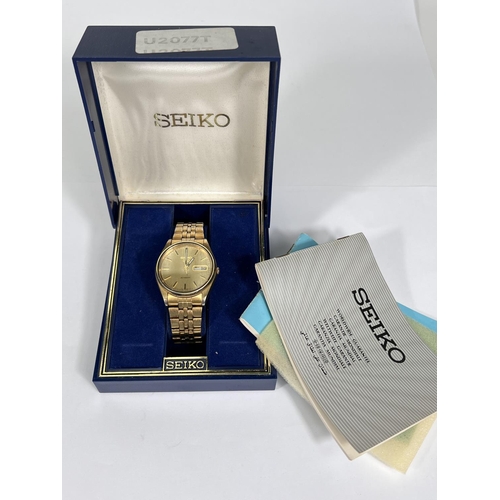 739 - A SEIKO 5 boxed gents wristwatch, gilt case and bracelet, automatic movement.