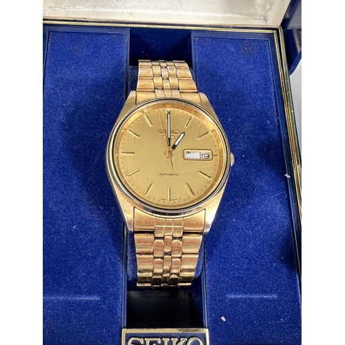 739 - A SEIKO 5 boxed gents wristwatch, gilt case and bracelet, automatic movement.