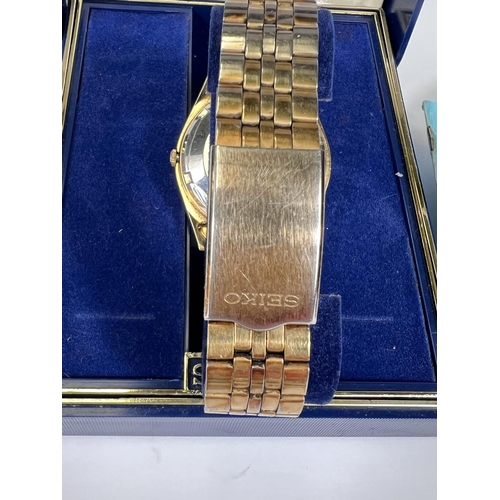 739 - A SEIKO 5 boxed gents wristwatch, gilt case and bracelet, automatic movement.