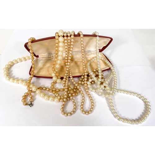 740C - A selection of various pearl, double and single string necklaces etc.