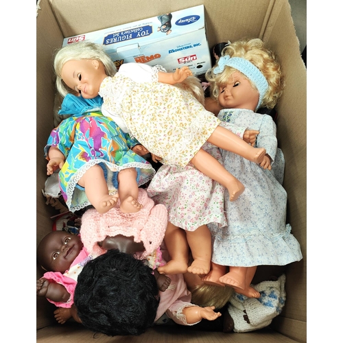 437 - A collection of vintage plastic dolls 