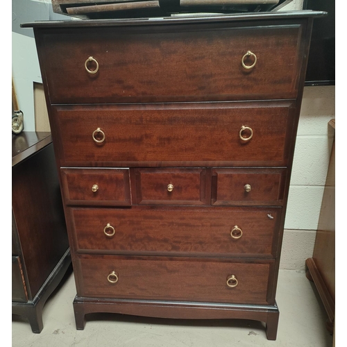 873 - A Stag mahogany chest of 4 long and 3 short drawers; another of 2 long and 3 short drawers