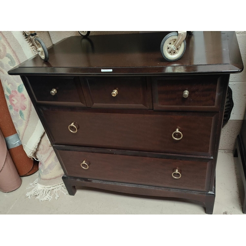 873 - A Stag mahogany chest of 4 long and 3 short drawers; another of 2 long and 3 short drawers