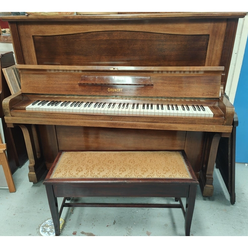 927 - A good quality Grunert overstrung mahogany cased upright piano with double headed eagle badge to fra... 