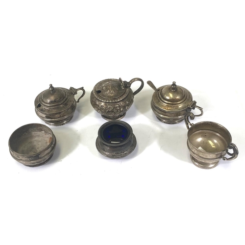 697 - A circular hallmarked silver part cruet set, Birmingham 1923 and 3 other hallmarked silver cruet pie... 