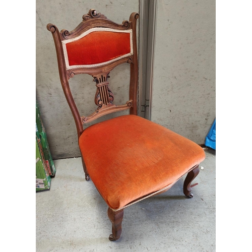 806A - An Edwardian mahogany nursing chairs with lyre back red/orange upholstery