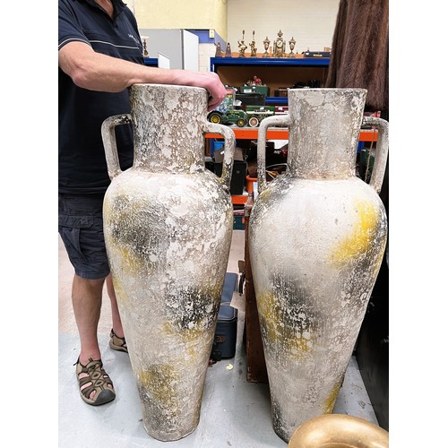 581 - A pair of large decorative period style 'amphora' vases in distressed finish, height 123cm