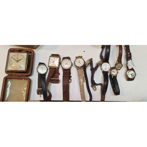 667C - A selection of vintage ladies and gents wristwatches including Accurist etc and a travel bedside clo... 