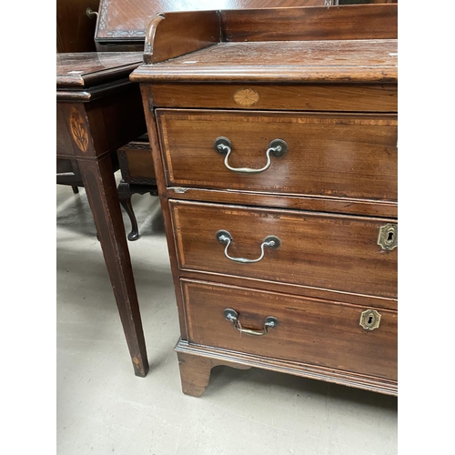 827 - A 19th century Sheraton style bachelors chest of 3 drawers, inlaid and crossbanded, with raised gall... 