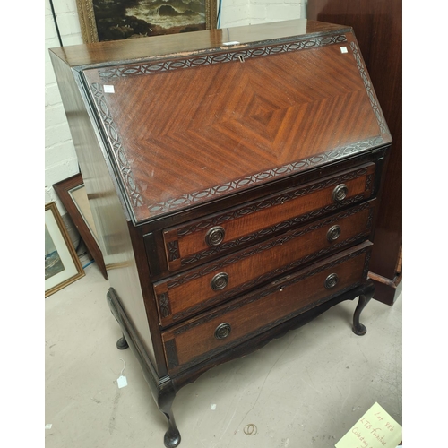 930 - An early 20th century period style mahogany bureau with fall front and 3 drawers, on cabriole legsNo... 