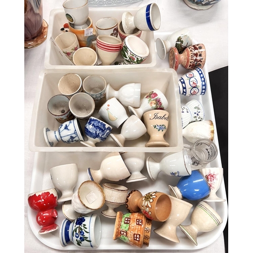 186 - A collection of egg cups; a Doulton willow pattern fruit bowl; a similar bowl; etc; A large selectio... 