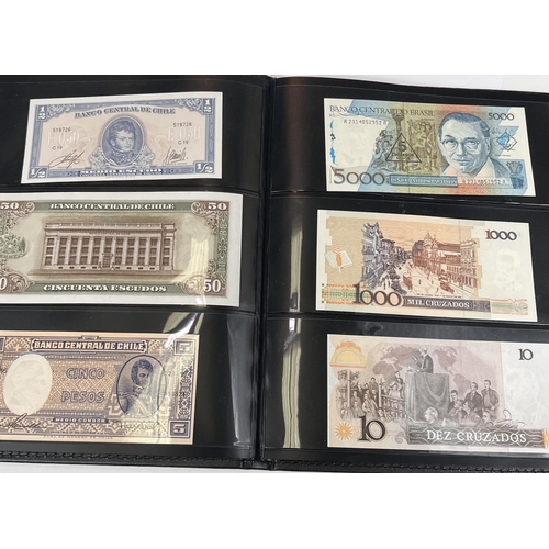 140 - A collection of 60 foreign banknotes in an album: Argentina, Brazil, Turkey, Japan, etc.