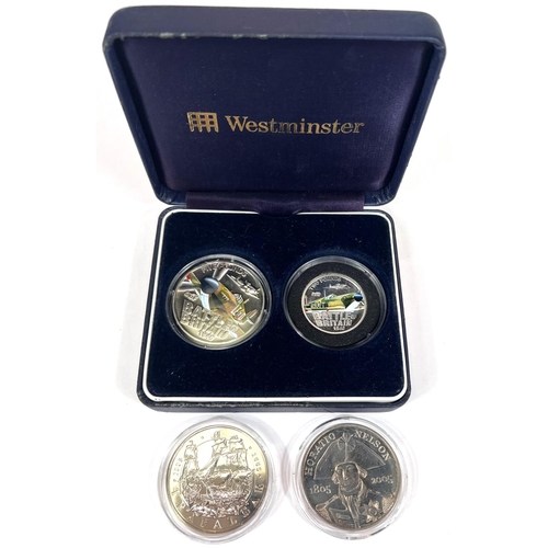 149 - Jersey 2010 Battle of Britain colourised £5 and £2 coins in Westminster box and two 2005... 