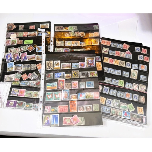 152 - A selection of Rhodesian stamps in folders, GV-QEII