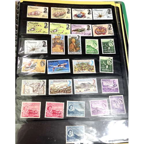 152A - An album of commonwealth stamps including issues from Australia, South Africa, Gibraltar, etc.