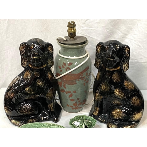 28A - A pair of black King Charles Spaniels (one cracked); a selection of Cabbage pottery; an oriental tab... 