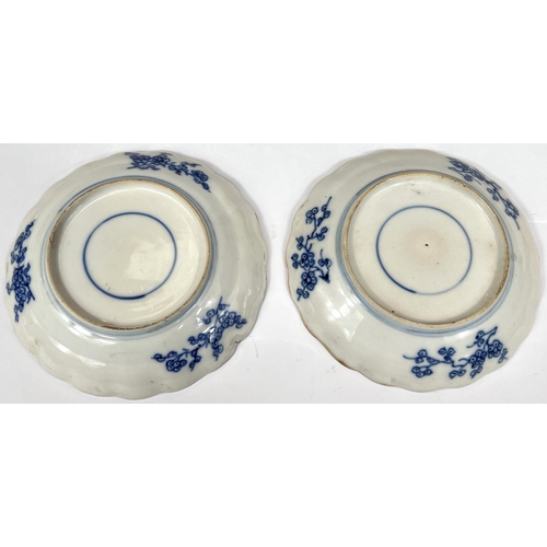 402 - A pair of Chinese 18th/19th small blue and white dishes with scalloped edges, floral decoration to b... 