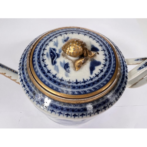 435 - A Chinese export blue and white teapot with over twisted handle, gilt and blue and white decoration ... 