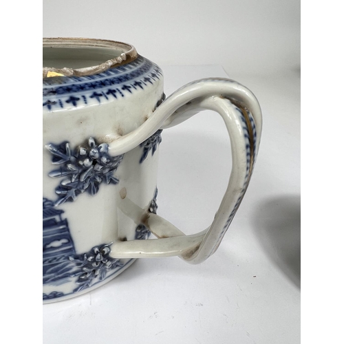 435 - A Chinese export blue and white teapot with over twisted handle, gilt and blue and white decoration ... 