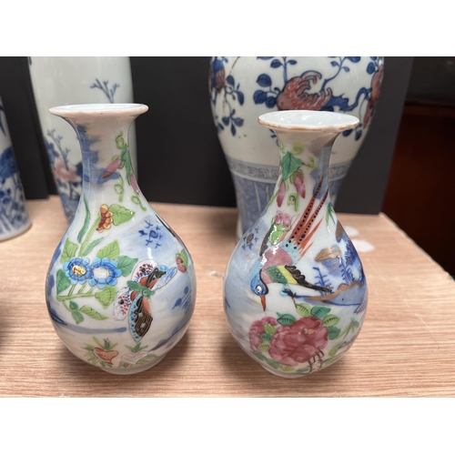 445C - A selection of various blue and white Chinese vases, ginger jars etc