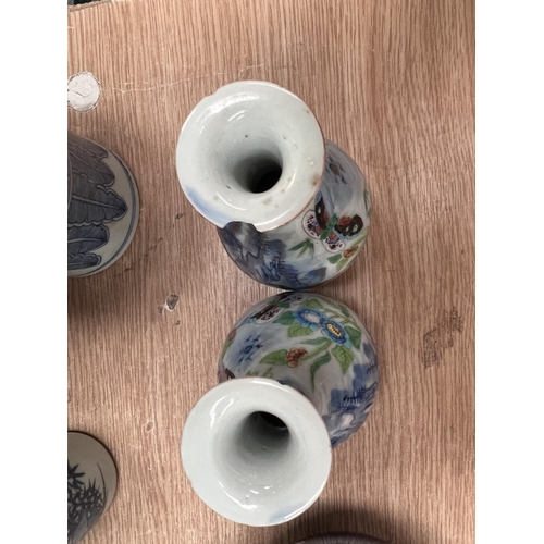 445C - A selection of various blue and white Chinese vases, ginger jars etc