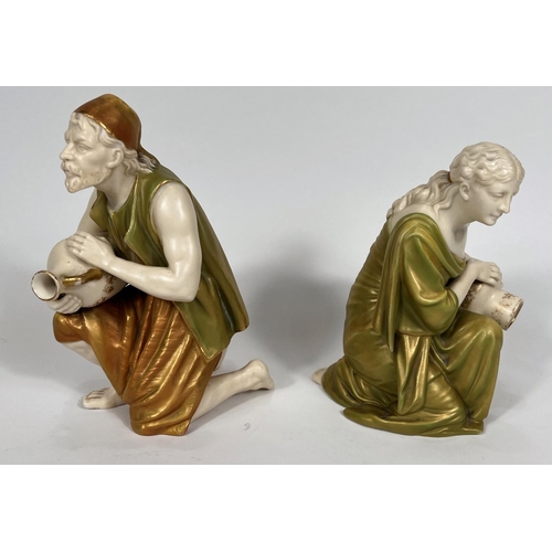 480 - A pair of Royal Worcester water carriers. male and female, holding amphorae, numbered 637, height 16... 