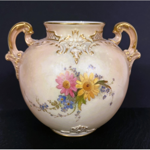 517 - A Royal Worcester lidded double handled vase, model No. 1515, decorated with flowers with gilt highl... 