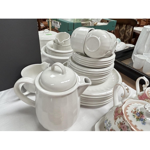 523 - A Unicorn Tableware white fluted part dinner and tea service; a Royal Albert 