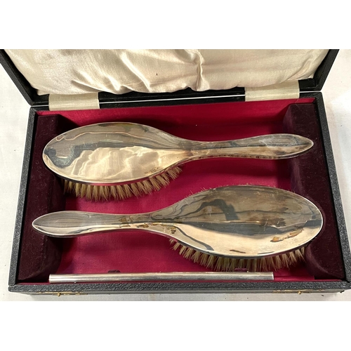 59 - A hallmarked silver 3 piece brush and comb set, cased; a 19th century bible; a Harmsworth New World ... 