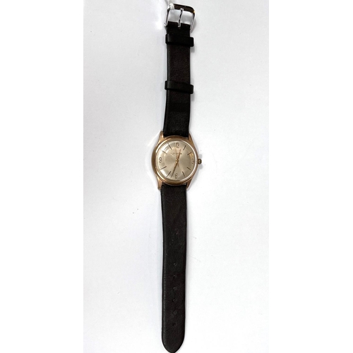 615 - DELBANA:a c.1965 Swiss manual watch with beige dial, gold hands and Arabic numerals and batons, ref ... 